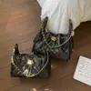 Bolso de mujer transfronterizo con un toque de lujo ligero, bolso de mano pequeño acolchado con cadena estilo Chanel, bolso tote de gran capacidad, moderno
