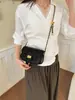 Bolso de axila de moda con nuevo diseño de diamantes, perfecto para primavera y verano, bolso de hombro versátil, bolso cruzado elegante, bolso de cadena negro de nicho para mujer para el verano
