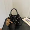 Bolso de mano retro y minimalista para mujer, nueva colección otoño 2026, elegante y con estilo, adecuado para ir al trabajo, bolso de hombro y bolso tote