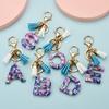 Llavero con 26 letras en inglés, estilo europeo y americano, con borlas de cristal acrílico transparente, adorno para bolso, pequeño regalo.