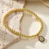 Nuevo Producto Transfronterizo Aogu: Pulsera Minimalista y Única de Cobre con Baño de Oro de 18 Quilates, Incrustación de Circonia y Dijes de Corazón, Ojo y Libélula