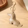Colgante llavero de perro salchicha lindo del fabricante, accesorio de bolso de piel sintética, colgante de perro salchicha para bolso