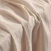 Tecido de algodão lavado pano de fundo vestido tecido de algodão vestuário imitação de linho de algodão pano branco 100 tecido para sofá