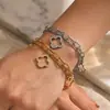 Pulsera de Acero Titanio con Trébol de Cuatro Hojas Incrustado de Diamantes de Alta Gama, Resistente al Desvanecimiento, Lujo Ligero, Versátil, Estilo de Nicho, Adecuada para Usar en la Ducha