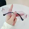 Gafas de sol sin montura de marco pequeño estilo europeo y americano para conducir y viajar, Gafas de sol de borde cortado de alta gama, Gafas de moda de lujo ligero con forma de diamante