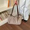 Bolsa de mano retro artística de lunares estilo coreano estilo universitario, nueva moda principios de otoño 2026, bolso de hombro grande de capacidad única