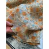 Camisa Floral Laranja Quente Atmosférica com Bordas Franzidas, Uso Versátil, Camisa de Linho com Manga Três Quartos para Mulheres, Novo Modelo de Verão 2026 H062907