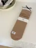 Calcetines de algodón de color liso para mujer, hasta la pantorrilla, calcetines holgados para maternidad, calcetines holgados de otoño e invierno, calcetines largos antibacterianos al por mayor