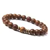 Elegante Pulsera de Piedra Natural para Hombre con Piedra de Madera Marrón y Acentos de Latón Diseño Elegante y Duradero Ajuste Ajustable Perfecta para Ocasiones Casuales y Formales Regalo Ideal para Él