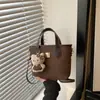 Bolso tipo cubo retro minimalista nuevo, bolso casual de moda, bolso de hombro y bandolera para mujer con textura, novedad primavera 2026