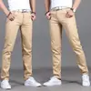Pantalones casuales de primavera y verano 2019 para hombre, pantalones casuales rectos de cintura media de corte entallado coreano para hombre, pantalones para hombre al por mayor.