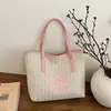 Nova Bolsa de Mão Popular Feminina Transfronteiriça de Verão Tendência Bolsa de Ombro para Praia Transversal Fashionável Bolsa Tecida de Nicho