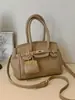 Elegante bolsa pequena de um ombro para mulheres, nova bolsa transversal versátil primavera/verão 2026, bolsa de mão requintada, moderna e da moda