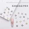 Nova Joia Garfo Cruzado para Nail Art Estilo Punk Escuro Liga de Metal Retrô Cruz X-Ring Acessórios para Unhas