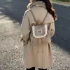 Bolsa de Hombro Doble de Gamuza Retro Linda para Mujer 2026 Nueva Versátil Casual para el Trabajo Mochila Portátil con Cierre de Cordón Bloque de Color