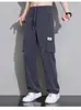 Pantalones de trabajo de seda helada transfronterizos para hombre, estilo fino de verano, marca de tendencia americana, pierna recta holgada, pantalones casuales de pierna ancha fluidos