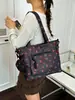 Diseño de nicho transfronterizo 2026 nuevo versátil exquisito moda para ir al trabajo sensación de alta gama bolso tote de hombro cruzado para almacenamiento