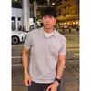 Camisa tipo polo de diseño falso de dos piezas, camiseta de manga corta para hombre, tacto de alta gama, corte holgado, top casual y versátil de media manga