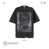 Camiseta de Manga Corta para Hombre con Estampado de Personaje de Marca de Hip-Hop Americano de Moda, Holgada, Estilo Nuevo de Primavera y Verano, Camiseta de Media Manga para Pareja