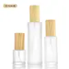 Tapa de grano de madera personalizada de fábrica para botella de loción tapa de vidrio esmerilado tapa de grano de madera para botella de spray loción esmerilada tapa de grano de madera se puede personalizar