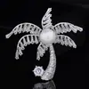 Ropa estilo coreano estilo broche de circón de coco para mujer pin de solapa de alta costura para traje abrigo venta al por mayor de fábrica