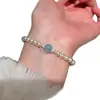 Pulsera Auténtica de Perlas Redondas con Calcedonia Azul Natural Cordón Elástico para Mujer, Estilo Suave Versátil de Nicho Otoño e Invierno