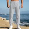 Pantalones casuales jacquard para hombre transfronterizos Amazon europeo y americano primavera y otoño comercio exterior color liso cordón casual sueltos deportivos joggers