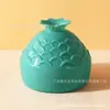 Caja de almacenamiento con forma de cuatro huevos de piña y melocotón de nieve, calabaza, gota de agua cortada oblicuamente, bola de belleza, cojín de aire, material de embalaje