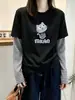Camiseta Manga Longa Patchwork Listrada Falsa Duas Peças Feminina Outono 2026 Solta Modeladora Senso de Design Camiseta Básica Cartoon