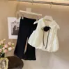 Nuevo Estilo de Verano 2026 para Niñas: Conjunto de Dos Piezas Versátil de Color Sólido con Top de Capullo de Flor + Pantalones Frescos para Ropa de Verano Infantil