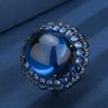 Novedad otoño e invierno Joyería Zhuang Shengsheng Traje de lujo ligero de corindón imitación sangre de paloma europea y cristal azul oro negro principal 18*20