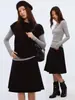 Conjunto de dos piezas de punto negro de manga corta de alta gama Yinhe para mujer, top base de manga larga para capas de otoño e invierno