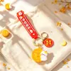 2026 Festival de Medio Otoño pequeño regalo llavero colgante, decoración de bolsa de conejito, regalos culturales y creativos para fiestas felices al por mayor