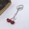 Llavero de Cereza de Moda Retro Europeo y Americano Más Vendido Transfronterizo con un Toque de Alta Gama, Accesorio Colgante de Fruta de Cereza para Bolsa