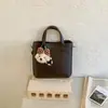 Bolso de Mano Simple de Alta Venta para Viajes Transfronterizos para Mujer 2026 Nuevo Bolso de Hombro Versátil con Aspecto de Alta Gama Bolso Cruzado