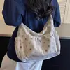 Bolsa de Lona Feminina Outono Inverno 2026 Nova Pequena Design de Nicho Bolsa de Ombro Único Transversal Estilo Coreano Casual Popular Este Ano Bolsa Tote