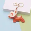 Pingente de Cachorro Ins Maluco Desenho Animado Cachorro Balançando Pingente de Couro Bolsa de Couro PU Artesanal Pingente Chaveiro de Carro