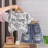 Ropa Infantil Conjunto de Verano de Manga Corta para Niños 2026 Nuevo Elegante Conjunto de Dos Piezas de Manga Corta con Cuello Redondo para Bebés y Niños Venta al por Mayor