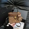 Suministro Directo de Fábrica Bolso Caja Retro con Cierre de Giro Bolso Colgante para Muñeca Bolso de Hombro Neceser Bolso Cruzado para Mujer Suministro Transfronterizo