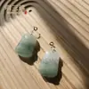 Pingente Tianshan Verde de Prata S925 com Padrão Floral de Xinjiang, Pingente da Paz Tianshan Verde, Fivela da Paz Ruyi de Dupla Face Pingente de Jade Atacado