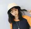 Sombrero de pescador de doble cara blanco y negro estilo coreano sombrero de sol para viajes de verano color sólido ala ligera casual todo-partido sombrero tipo cubeta para hombres y mujeres