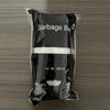 Bolsa de basura con cordón de impresión en rollo grande engrosada, chaleco desechable de cocina negro, portátil, cierre automático, basura