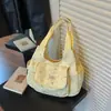 Bolsa Tote de Ombro/Axila Versátil Exquisite Fashion High-End para o Trabalho, Design de Nicho Novo, Verão 2026, Transfronteiriça