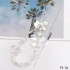 Corrente para celular com contas novo doce desenho animado laço capa de celular pingente de cordão pingente corda portátil anti-queda atacado