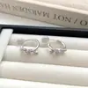 Aretes de Nudo de Cuerda Dorada para Mujer, Diseño de Nicho de Lujo Ligero, Temperamento Único de Gama Alta, Pinzas para Orejas Únicas, Accesorios para Orejas, Nuevo Estilo Caliente 2026