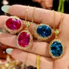 2026 Novo Conjunto de Anel e Pingente Oval com Espinélio Azul Simulada Base de Cobre Banhado a Ouro Zhuang Sheng Sheng Joias 12*16