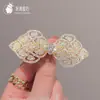 2023 Corea del Sur pasador de strass clip de resorte para la parte trasera de la cabeza clip superior elegante clip tocado lazo pasador de perla femenino