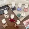 Pinza para el cabello con lazo bordado de dibujos animados en tela estilo coreano, par de gomas para coleta de alta elasticidad para niños y bebés