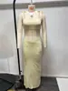 Verano 2025 Nuevo Traje Sexy de Dos Piezas con Falda Larga y Top Halter Ajustado al Cuerpo Estilo Europeo y Americano Estación Independiente Transfronteriza para Mujer