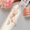Modelo Nuevo Colgante de Corazón Campana de Flor Corazón Gordo de Colores UV Colgante para Llavero de Teléfono Decoración de Bolsa Colgante